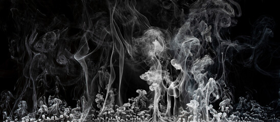 Abstract smoke on a dark background . Isolated .