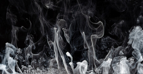 Abstract smoke on a dark background . Isolated .