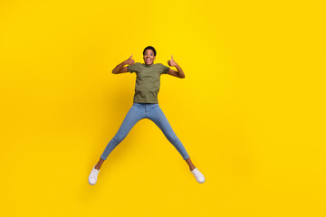Fototapeta na wymiar Full body portrait of energetic person show thumb up gender equality isolated on yellow color background