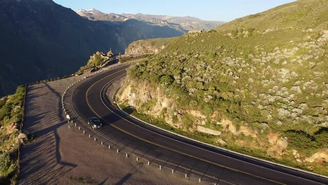 Colca Canyon, Peru: Aerial drone footage of the road along the famous Colca Canyon and the Cruz del Condor near Arequipa in in the Andes mountain in Peru in south America