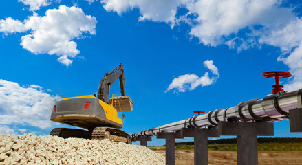 Tractor near gas pipes. Pipeline construction. Construction pipeline for gas export. Construction...