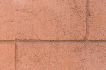 Cement fragment close-up red light color brown element concrete texture background pattern