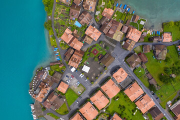 Aerial view of Iseltwald village on Brienzer see lake in Interlaken Switzerland