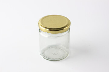 Empty transparent food jar container on white background