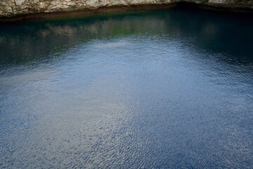 The surface of seawater collected in a large hole called "Toriike Pond."