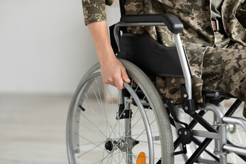 Disability Retirement. Closeup Shot Of Military Woman Sitting In Self-Propelled Manual Wheelchair