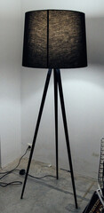 floor lamp in the room against the wall on the floor