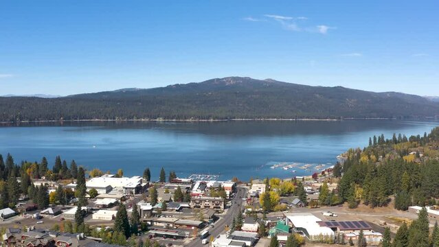 Wide aerial pulling away from the town of McCall in Idaho.