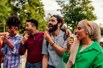 Group of friends licking ice cream