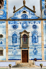 facade covered with azulejos of the church Santa Marinha in Cortegaca, Ovar district, Portugal