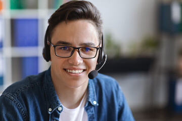 Call Center Operator. Closeup shot of friendly customer service worker in headset