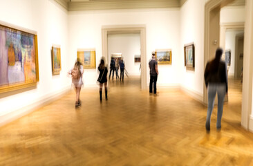Blurred image of people in the exhibition hall