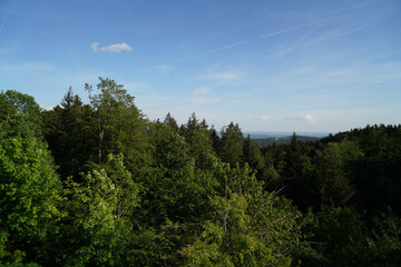 Landscape photos in the Bavarian Forest with fascinating clouds and blue sky