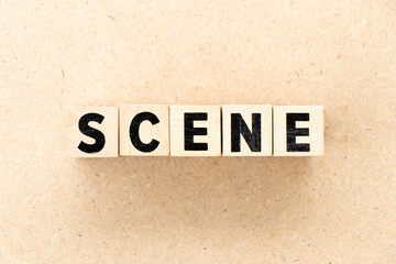 Alphabet letter block in word scene on wood background