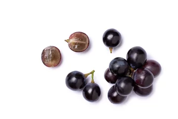 Fotobehang Bunch of dark blue grape isolated on white background, top view, flat lay. © NIKCOA