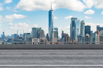 Empty urban asphalt road exterior with city buildings background. New modern highway concrete construction. Concept of way to success. Transportation logistic industry fast delivery. New York. USA. - Powered by Adobe