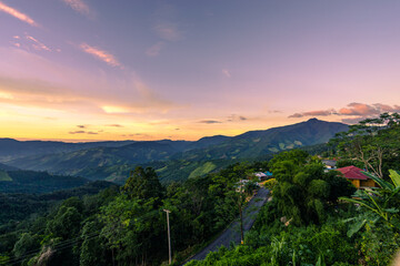 Beautiful sunset scenic with light shade into the mountain which locates in rural countryside