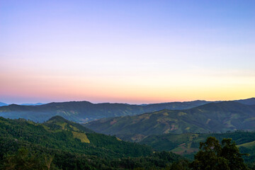 Fototapeta na wymiar Beautiful sunrise scenic with light shade into the mountain