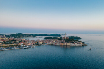 Naklejka premium Aerial view of the old town of Rovinj with Church of Saint Euphemia on the Mediterranean sea , Rovinj, Croatia