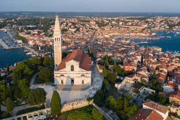 Fototapeta premium Aerial view of the old town of Rovinj with Church of Saint Euphemia on the Mediterranean sea , Rovinj, Croatia