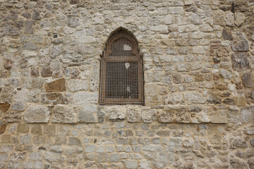 Fototapeta na wymiar Beige stone wall texture background