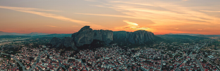 Greece Meteora landscape at sunset panorama. Kalabaka village and rock. Europe travel destination