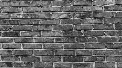 brick wall black and white photo with selective focus, exterior