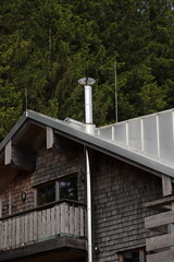 new stainless steel chimney on a house