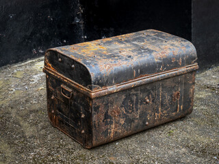 Old metal trunk, coffer. Rusty.