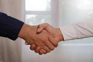 Partnership Business handshake  trust Deal Success,Business owners shake hands to agree to work.Partners hold hands to accept work.Businessman agree concept