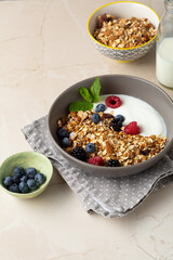 Close up of granola breakfast bowl with vegan yogurt food