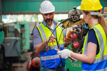 Service and maintenance concept. Service manager male engineer explain the procedure for using the...