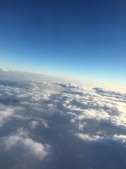 above the clouds, sunbeams above the cloud cover, shots from the plane