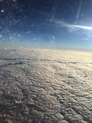 above the clouds, sunbeams above the cloud cover, shots from the plane