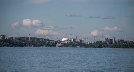 Fototapeta na wymiar View over the central water way from the archipelago, sky scrapers, the glob Globen, Avicii arena, a summer day in Stockholm
