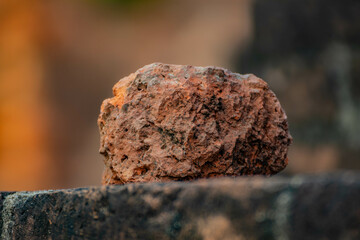 Laterite rock on the brick with blurred background.