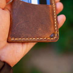 The Handmade brown vintage cardholder.