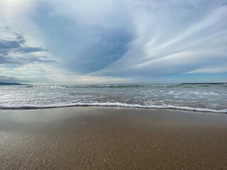 Sunset by the sea on a cloudy days