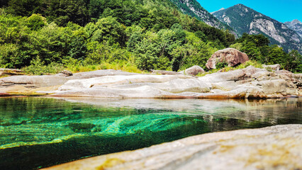 Naklejka na ściany i meble Beautiful Verzasca River at Lavertezzo in the Verzasca Valley, Ticino Tessin in Switzerland.- Nature landscape background