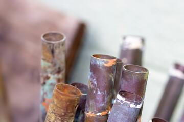 Close up view of old rusty weathered metal rods, selective focus.