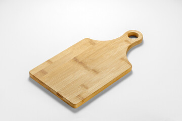 Wooden cutting board on white background