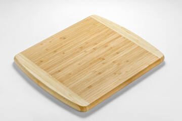 Wooden cutting board on white background