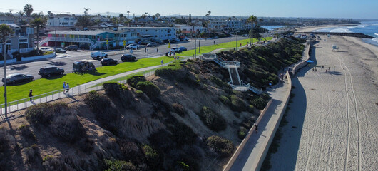 A view of the Carlsbad, California, Cliffs and Downtown, showing the Recreation Path and the Beach