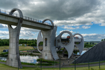 view of the hydraulic Falkirk Wheel boat lift transporting a boat from the lower to the upper canal