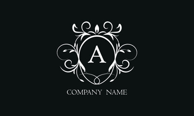 Fototapeta premium Elegant floral monogram with decorative elements and the letter A. Template for invitations, labels, business. Wedding monograms. Exquisite calligraphic ornament.