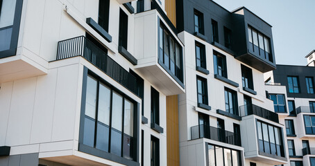 facade of modern stylish designer apartments in a premium house