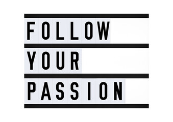 Motivational Follow Your Passion success quote on retro board. Business leadership entrepreneur success