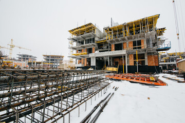 type of complex engineering construction of houses in winter time