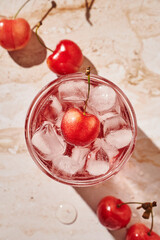 refreshing lemonade with ice and cherries