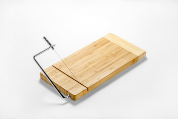 Special cutting board for cheese on a white background